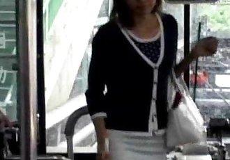 A young Asian girl enters a public bus and sits down from http://alljapanese.net - 56 sec
