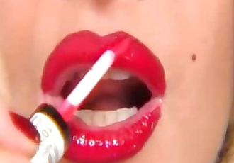 rojo barra de labios Mamada