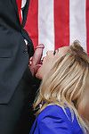 Blonde MILF pornstar Cherie Deville baring big boobs while blowing cock