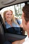 Liberated blonde MILF performs a blowjob with ball licking in the car