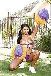 Latina cheerleader Sadie Santana giving a glimpse of her pussy in backyard - part 2